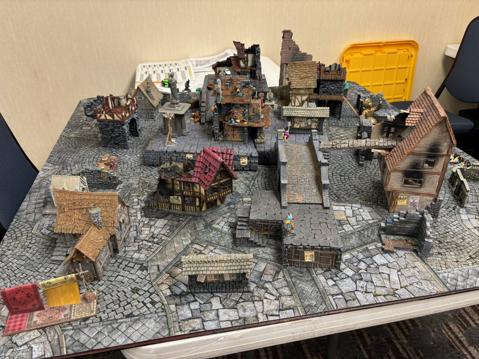 Warbands skirmishing on a ruined market rooftop